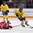 ST. CATHARINES, CANADA - JANUARY 15: Russia's Fanuza Kadirova #17 falls to the ice while Sweden's Sofie Lundin #17 carries the puck up ice during bronze medal game action at the 2016 IIHF Ice Hockey U18 Women's World Championship. (Photo by Jana Chytilova/HHOF-IIHF Images)

